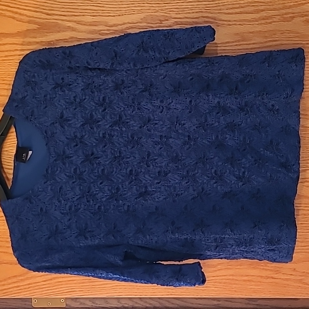 Stretch lace, lined j.t.b. woman's top in navy blue.